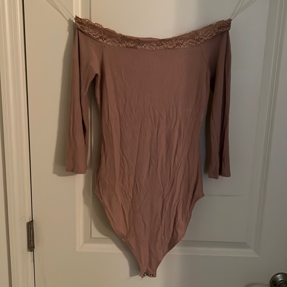 Champagne colored off the shoulder body suit